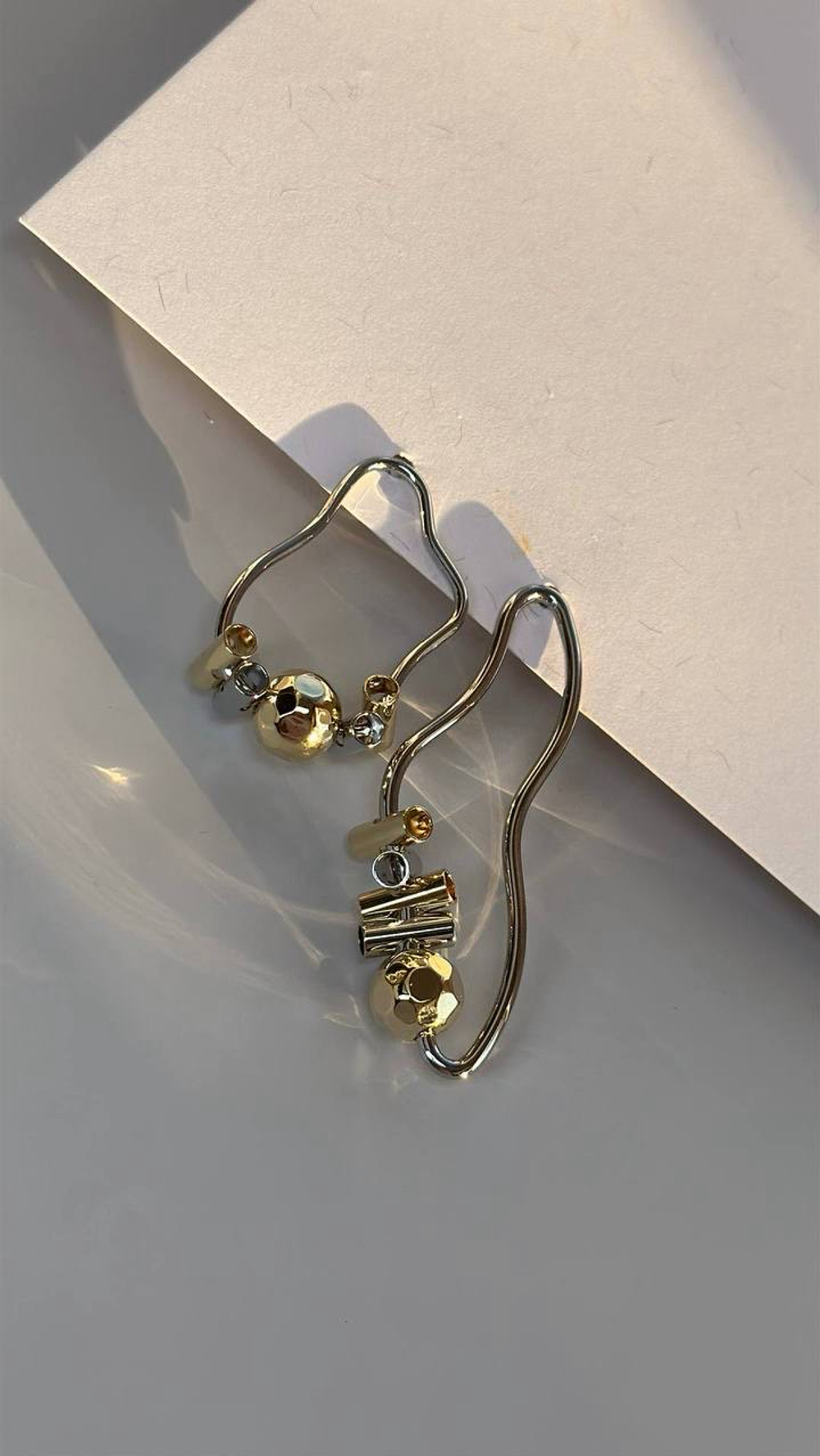 Серьги гравитация