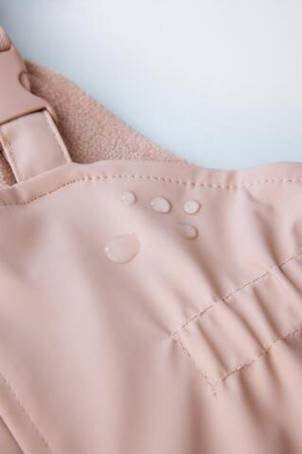ZARA ПРОРЕЗИНЕННЫЙ КОМБИНЕЗОН WATER RESISTENT, РОЗОВЫЙ