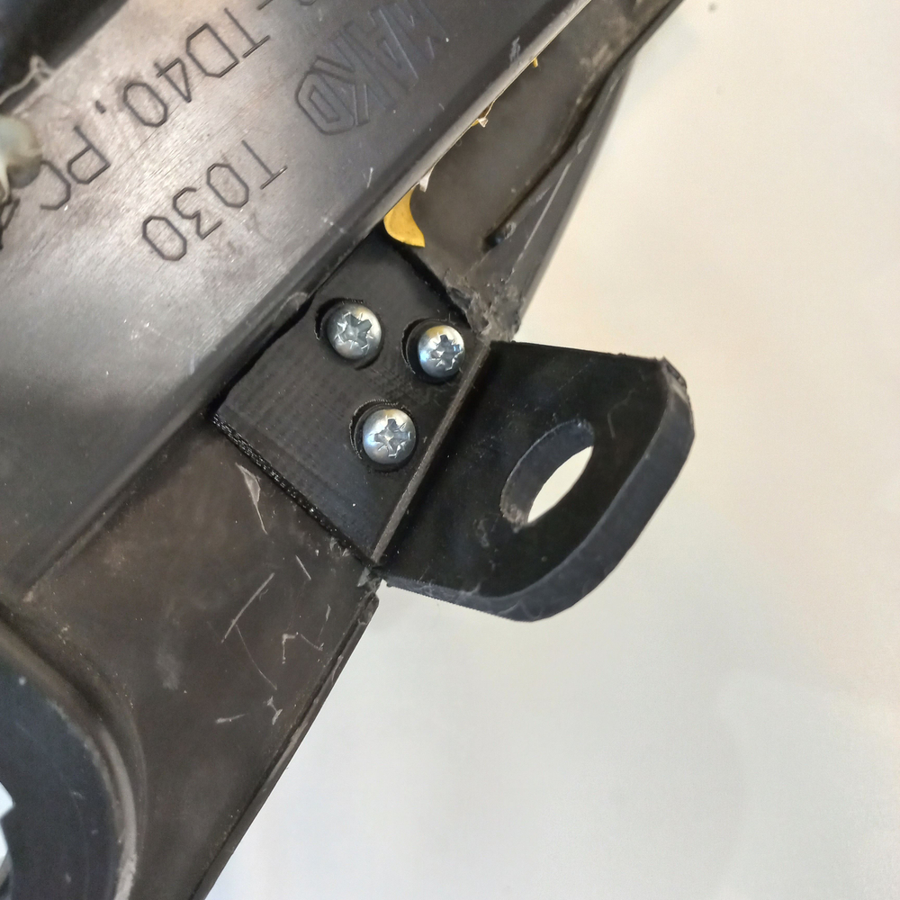 Кронштейн крепления фары для Fiat Doblo 2005-2015 года. Рестайлинг 1