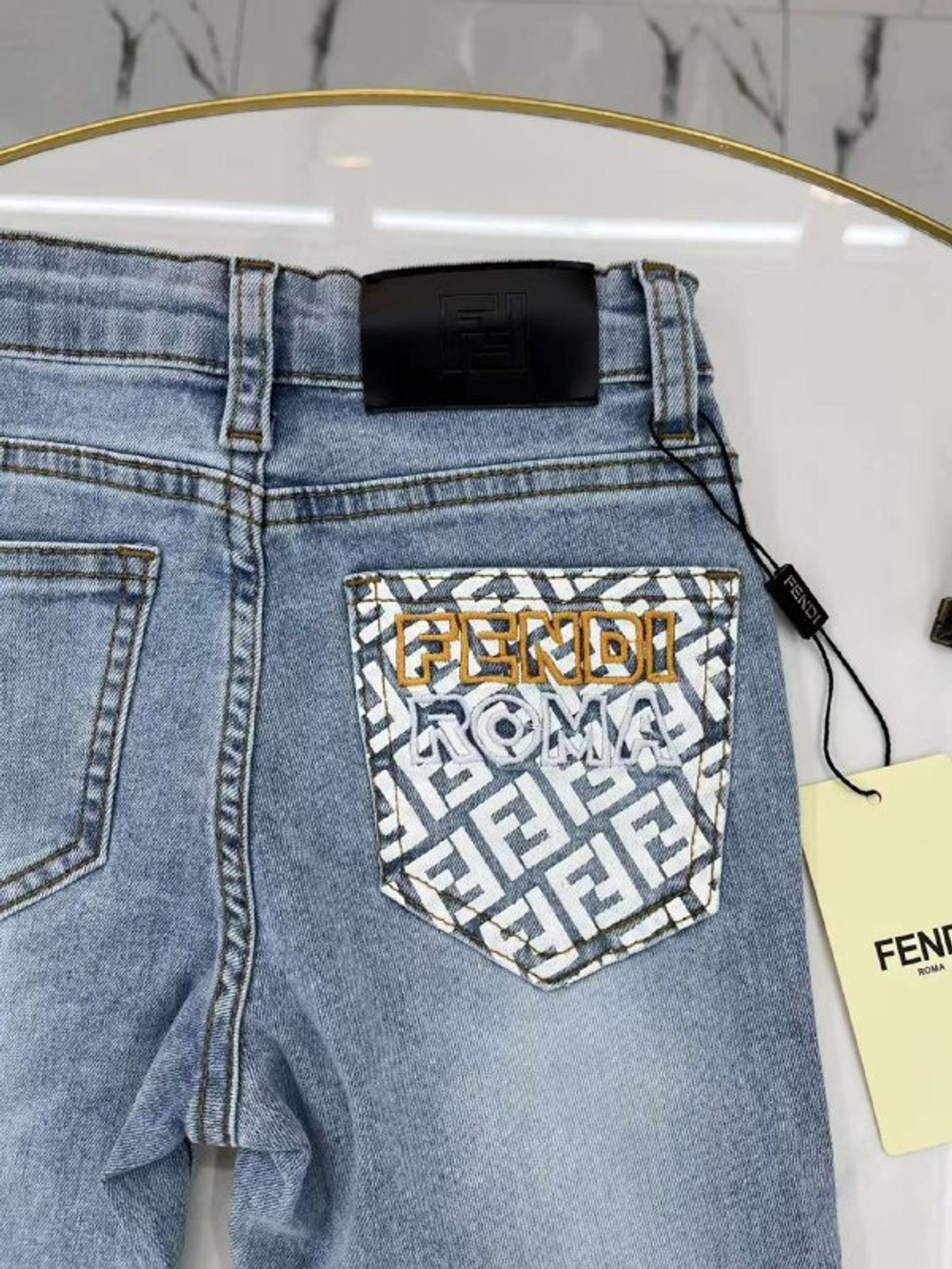 Детские джинсы Fendi