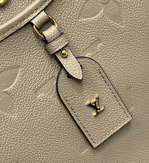 Сумка Louis Vuitton Trianon MM бежевый