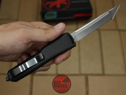 Нож Microtech Ultratech TFS/E - черная рукоять, клинок серрейторный RK-401