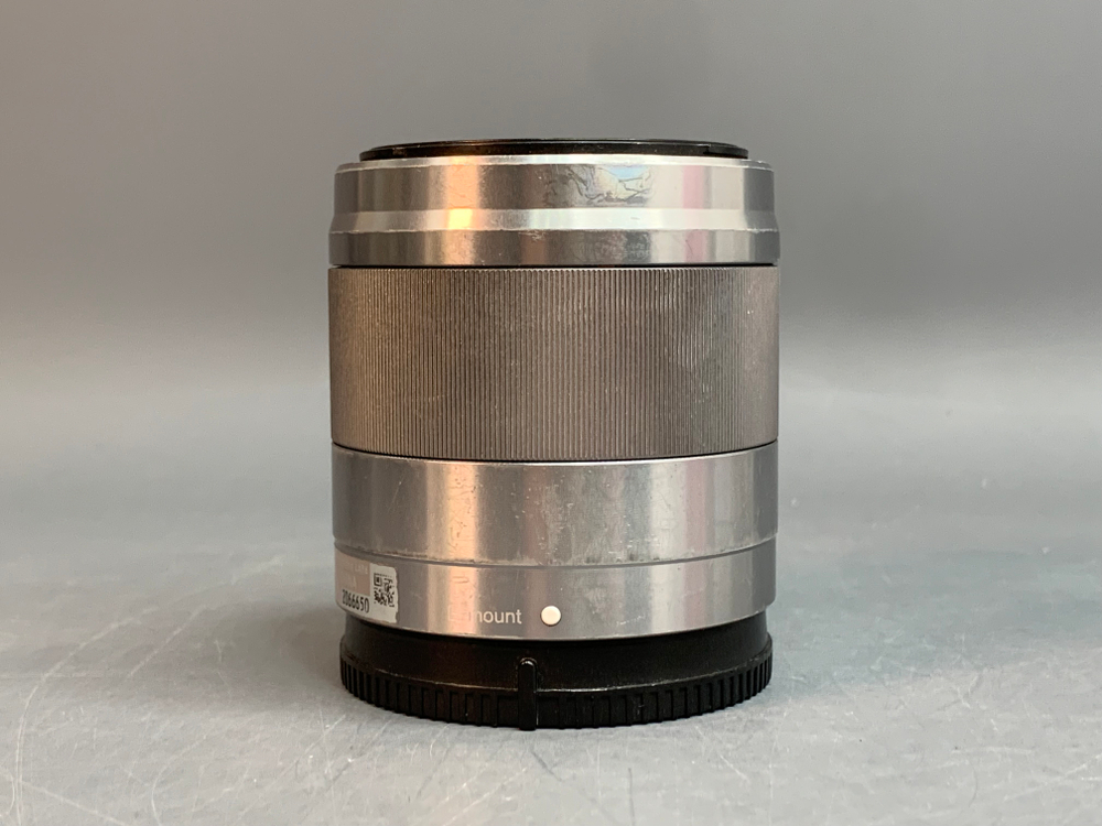 Sony 50mm 1.8 OSS внутри пыль