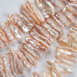 Жемчуг культивированный Бива, розово-персиковый, с боковым центральным отверстием, 18-30*6-9мм