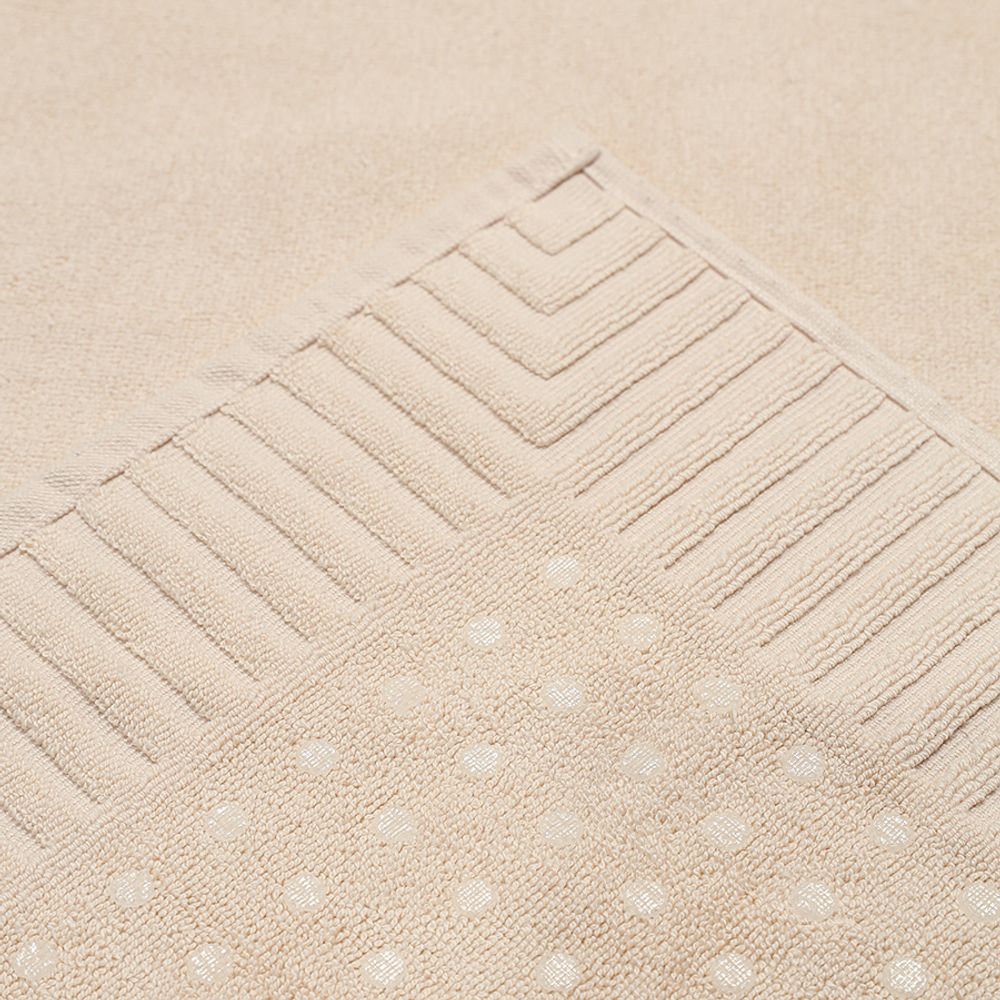 Коврик для ванной с фактурным бортиком кремового цвета из коллекции Essential, 50x80 см