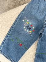 Джинсы Gucci, 86