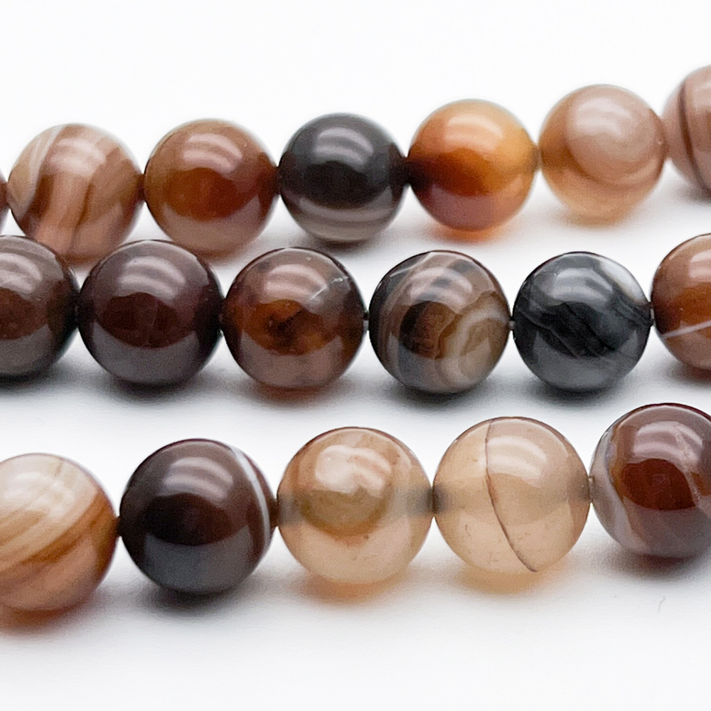 Агат тонированный коричневый бусины, диаметр 10,1-10,3 мм, цена за 18-19 шт (1/2 нити)