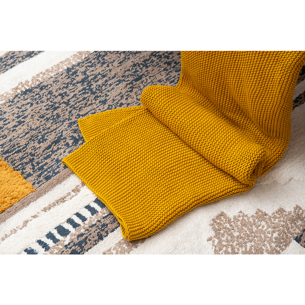 Плед из хлопка жемчужной вязки горчичного цвета из коллекции essential, 130х180 см