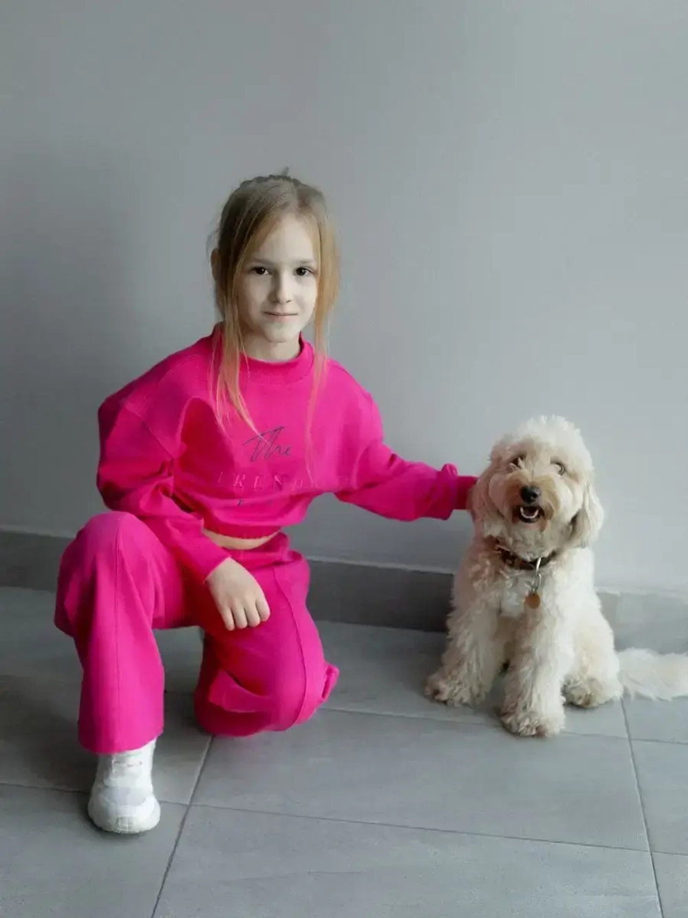 Розовый костюм для девочки на осень