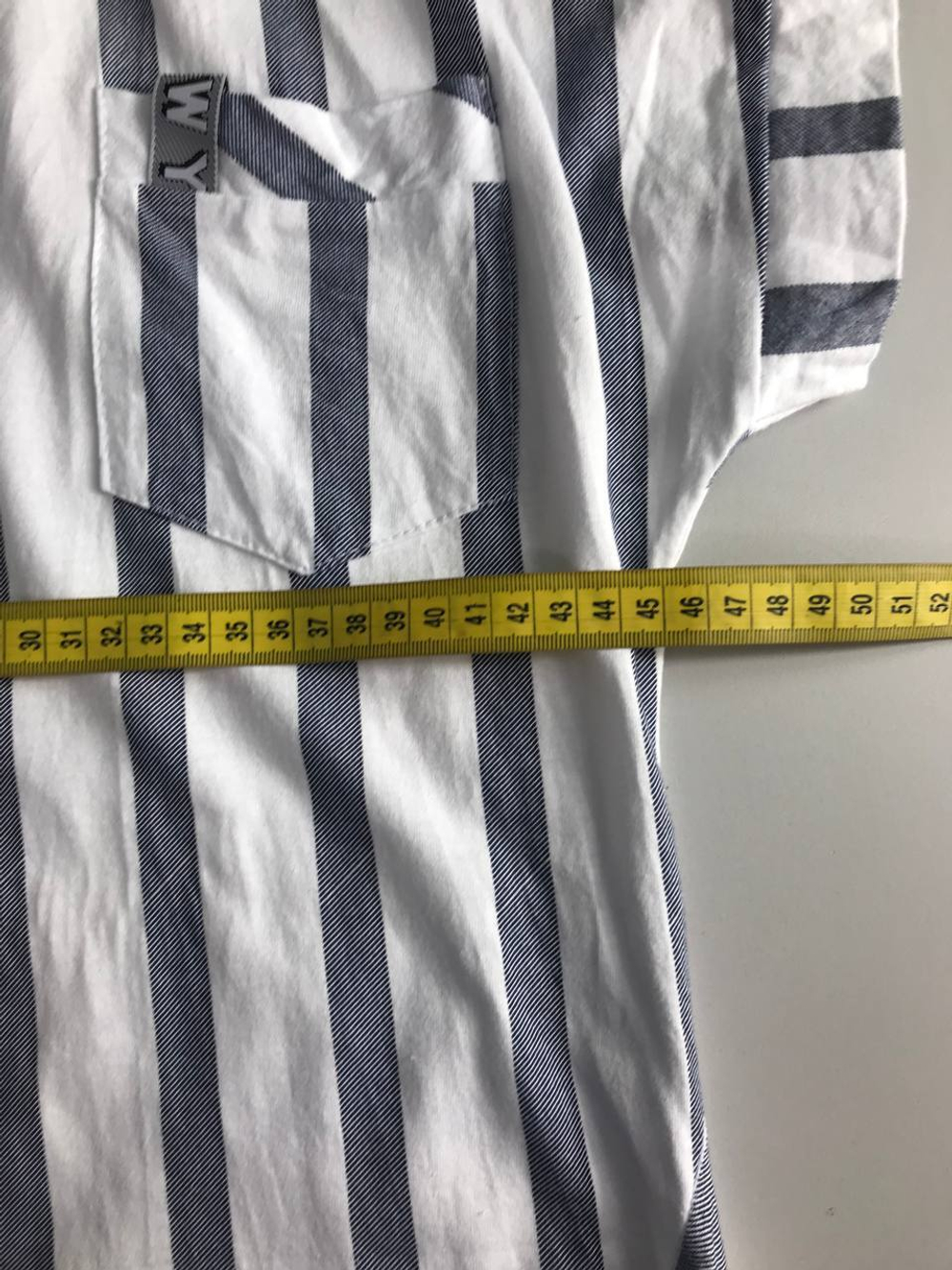 Блузка в крупную полоску, визуально на 46 размер