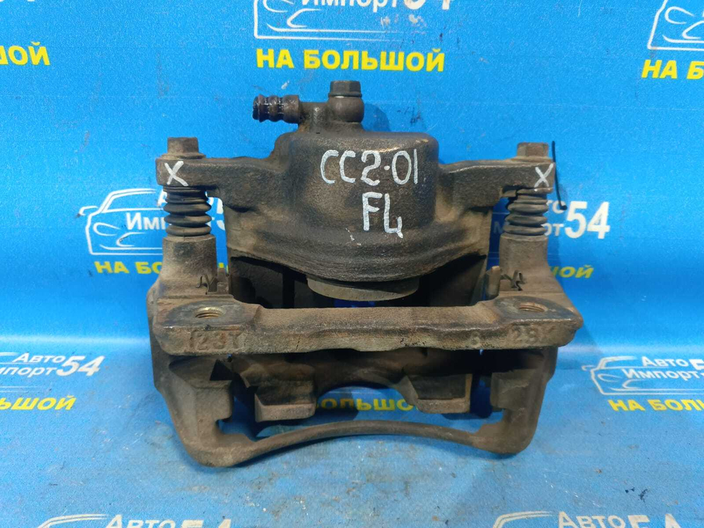 Суппорт тормозной передний левый Honda VIGOR 1992