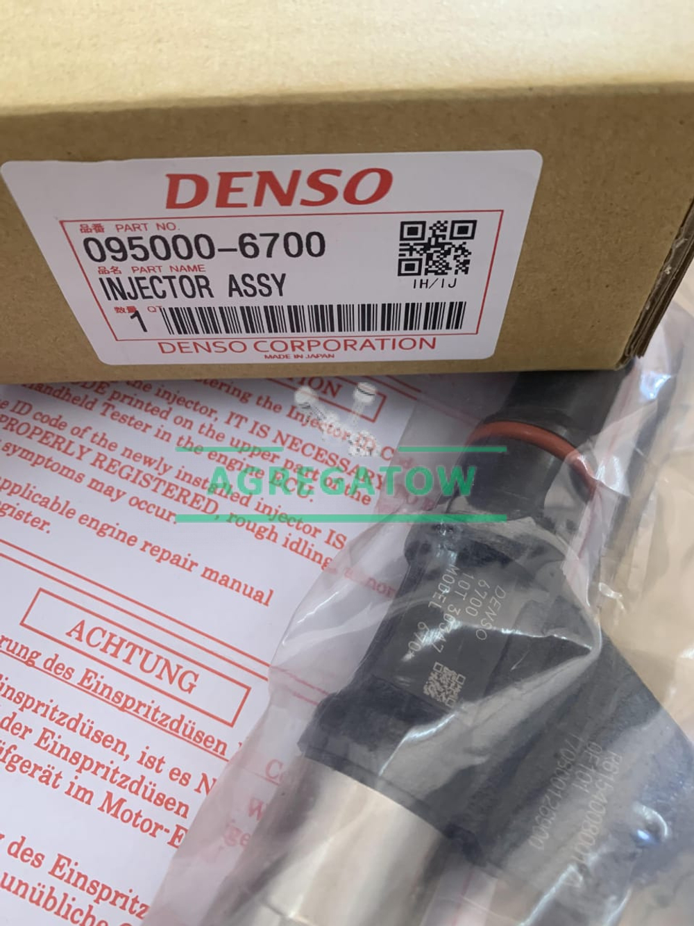 Форсунка топливная Denso 095000-6700 / 61540080017