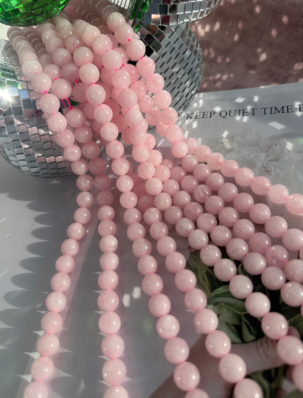 Нить бусин из розового кварца 10,4мм, гладкие
