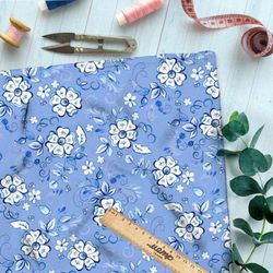 Ткань бифлекс редкие элементы гжели на голубом фоне