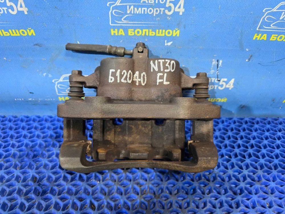 Суппорт тормозной передний левый NISSAN X-TRAIL 2000-2007