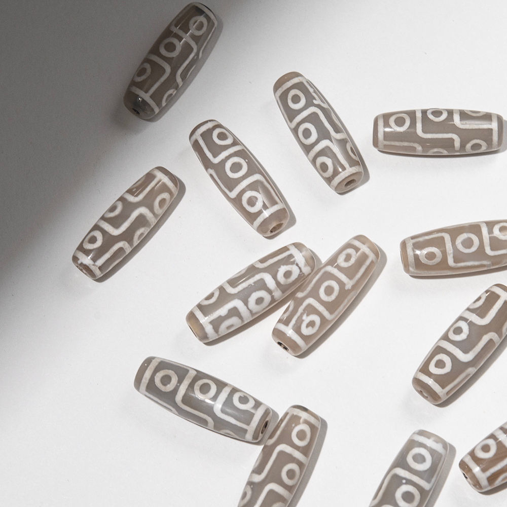 Бусина Дзи "Девять глаз" из агата, 29*10мм, белый