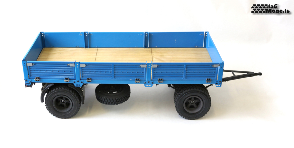 Trailer 2-axle flatbed in scale 1/14