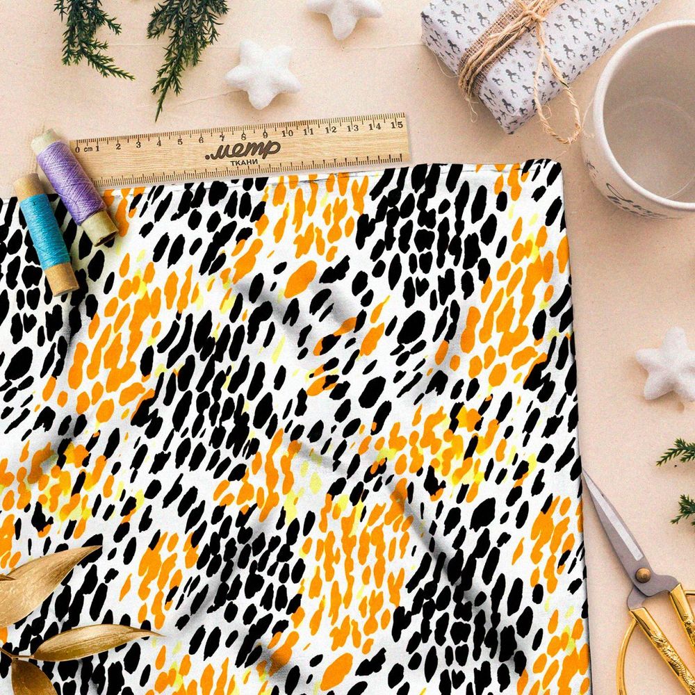 Ткань Ниагара Софт черно-желтые пятна