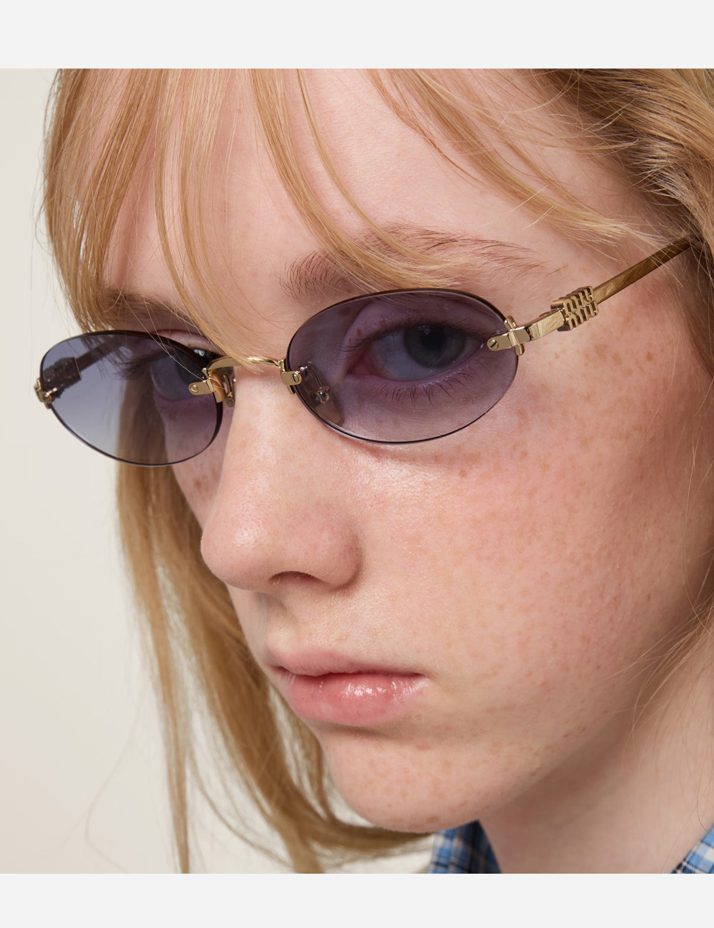 Солнцезащитные очки Miu Miu Logo Indigo lenses