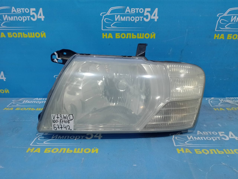 Фара передняя левая MITSUBISHI PAJERO 2002-2006