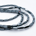 Гематит Брусок бусины (имитация), цвет черный, размер около 9*3 мм, цена за 21-22 шт (1/2 нити)