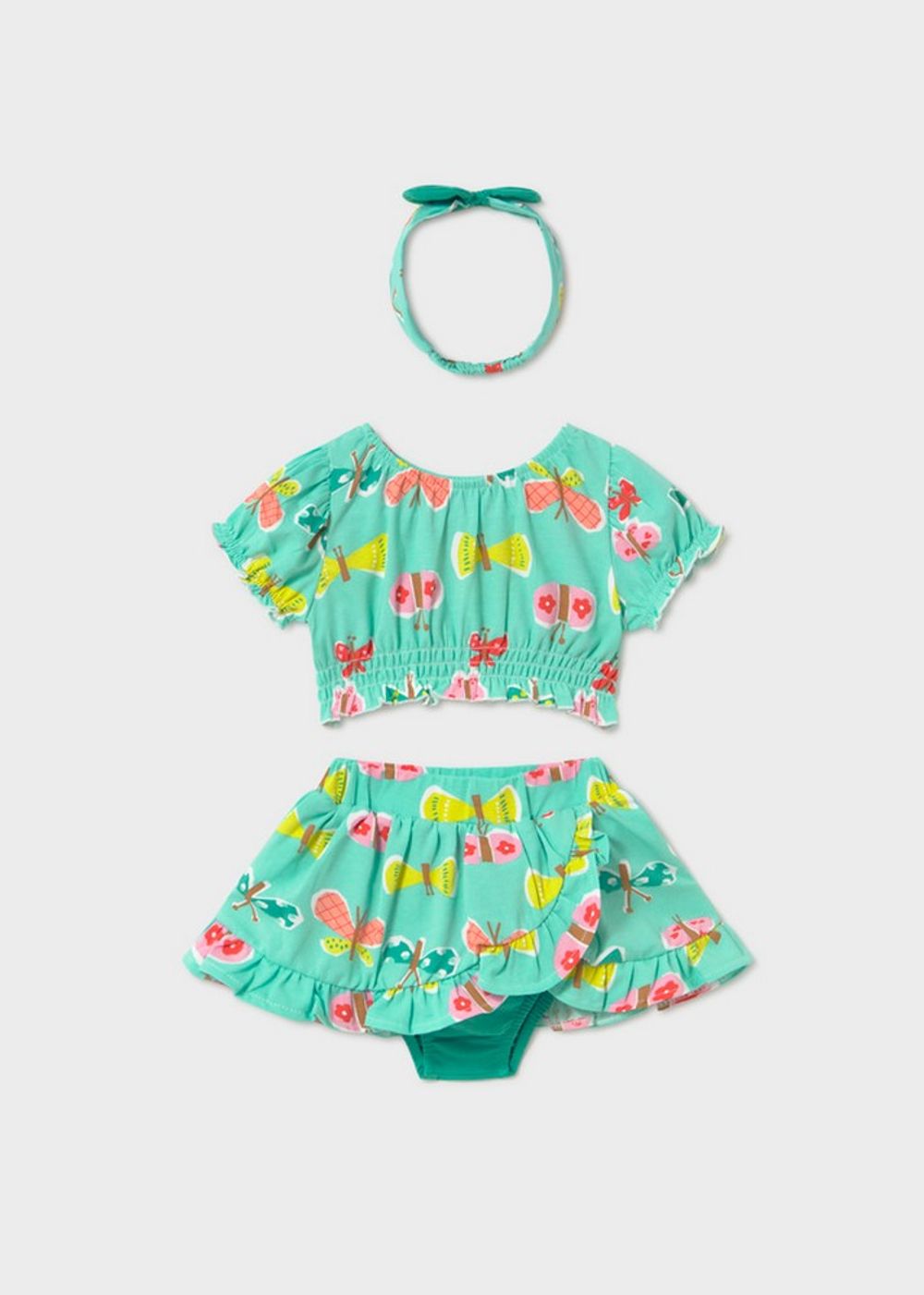 топ с юбкой и повязкой на голову