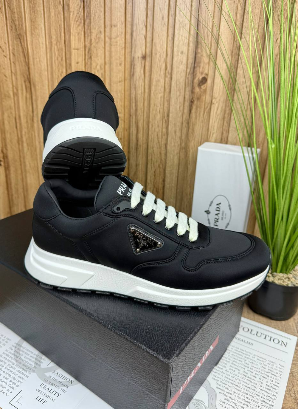 Кроссовки Prada