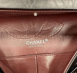 Черная сумка Chanel 2.55