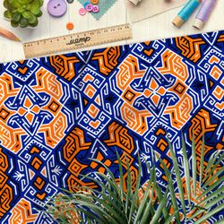 Ткань атлас оранжевый египетские узор