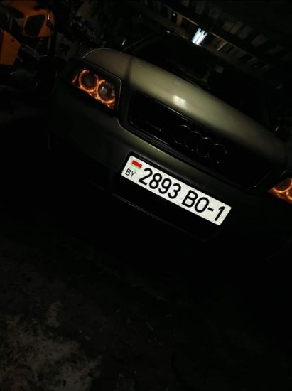 Передние фары Audi A6 C5 angel eyes black