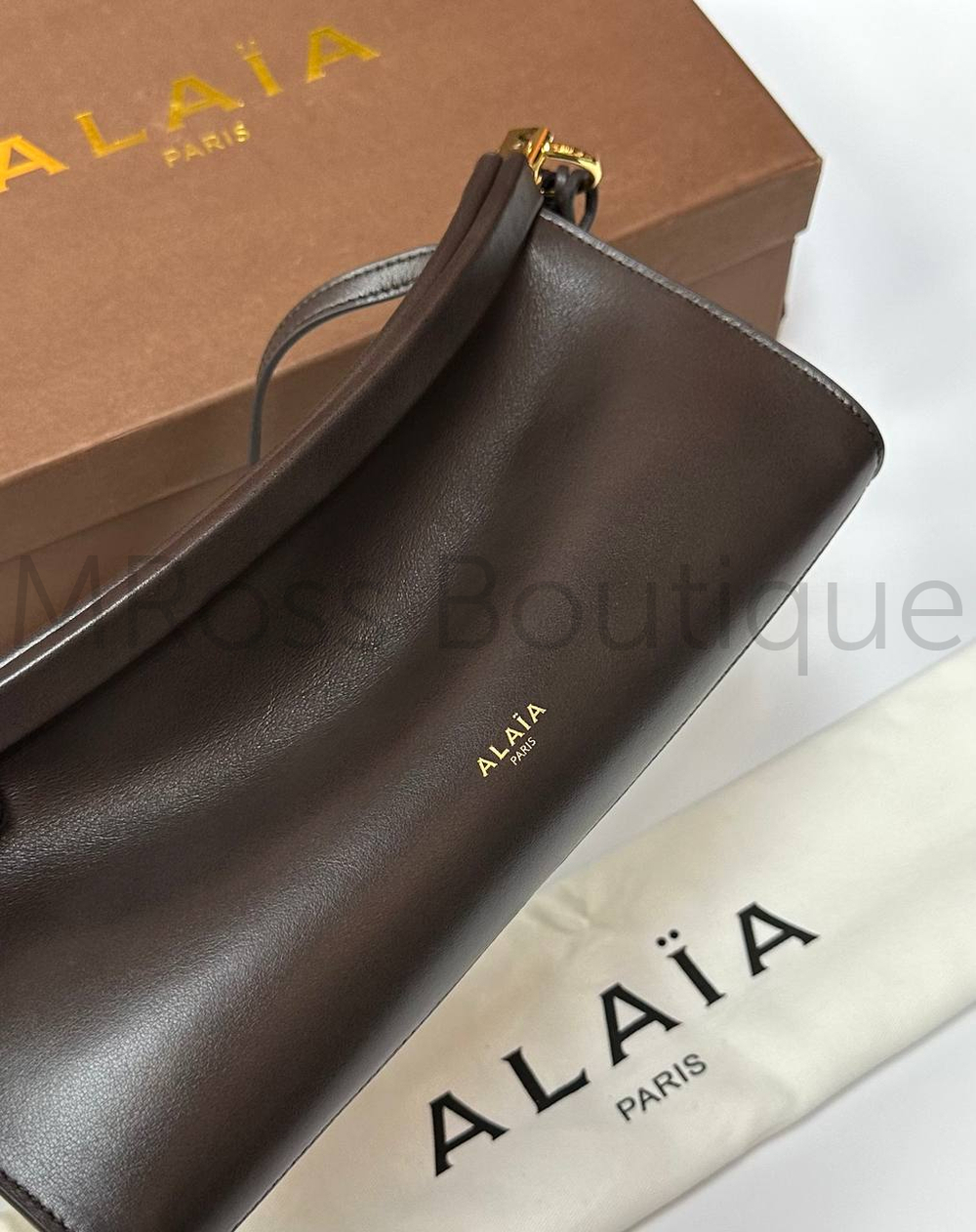 Женская сумка Alaia Le Click East West коричневого цвета