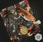 Латунная монета Черепа