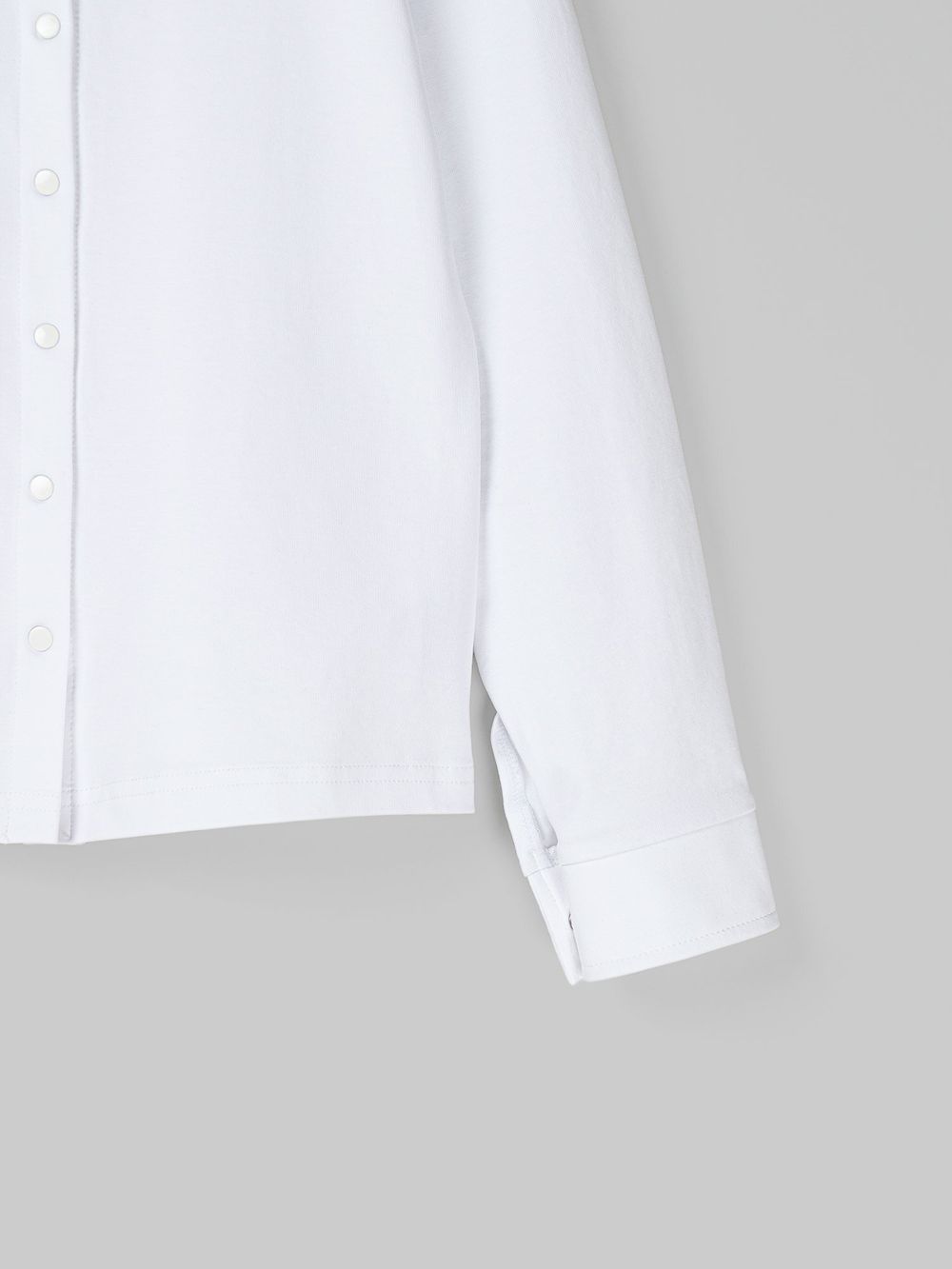 Блузка трикотажная для девочки "Белая" на кнопках 7+