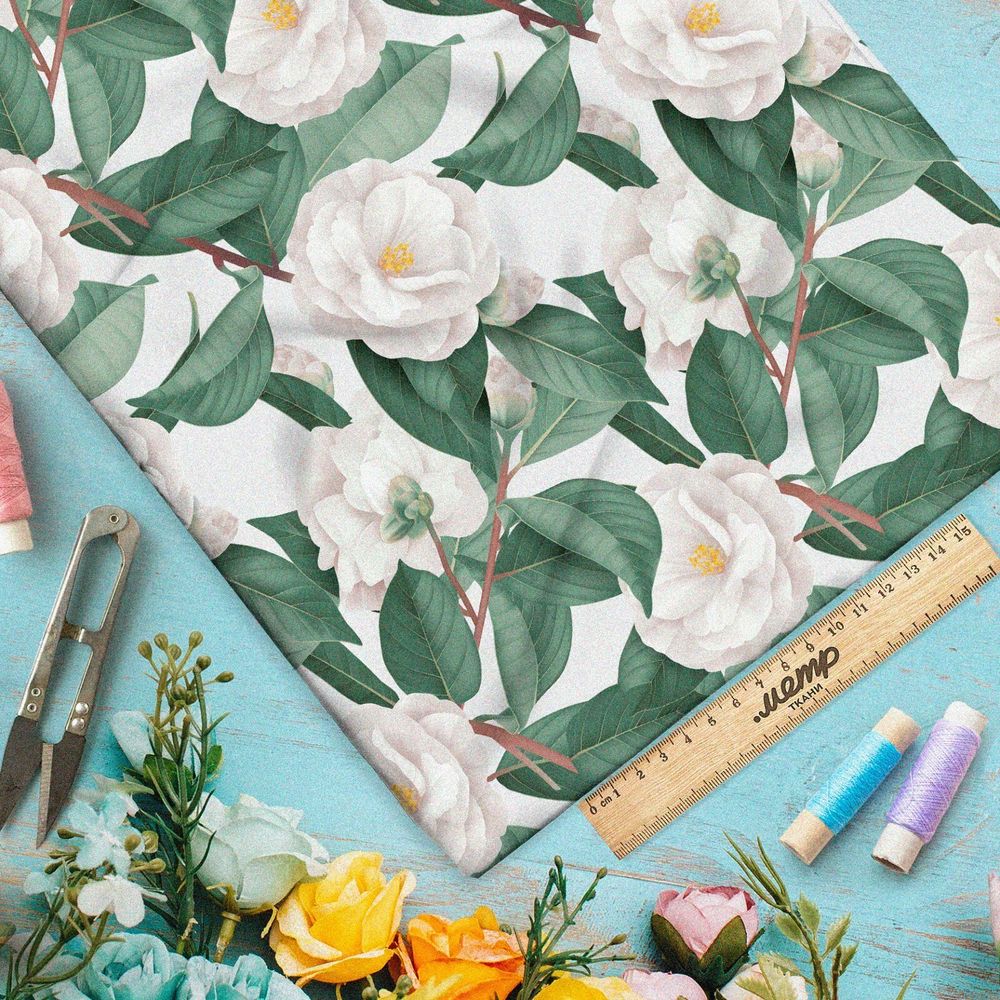 Ткань кулирная гладь белые цветы в листьях