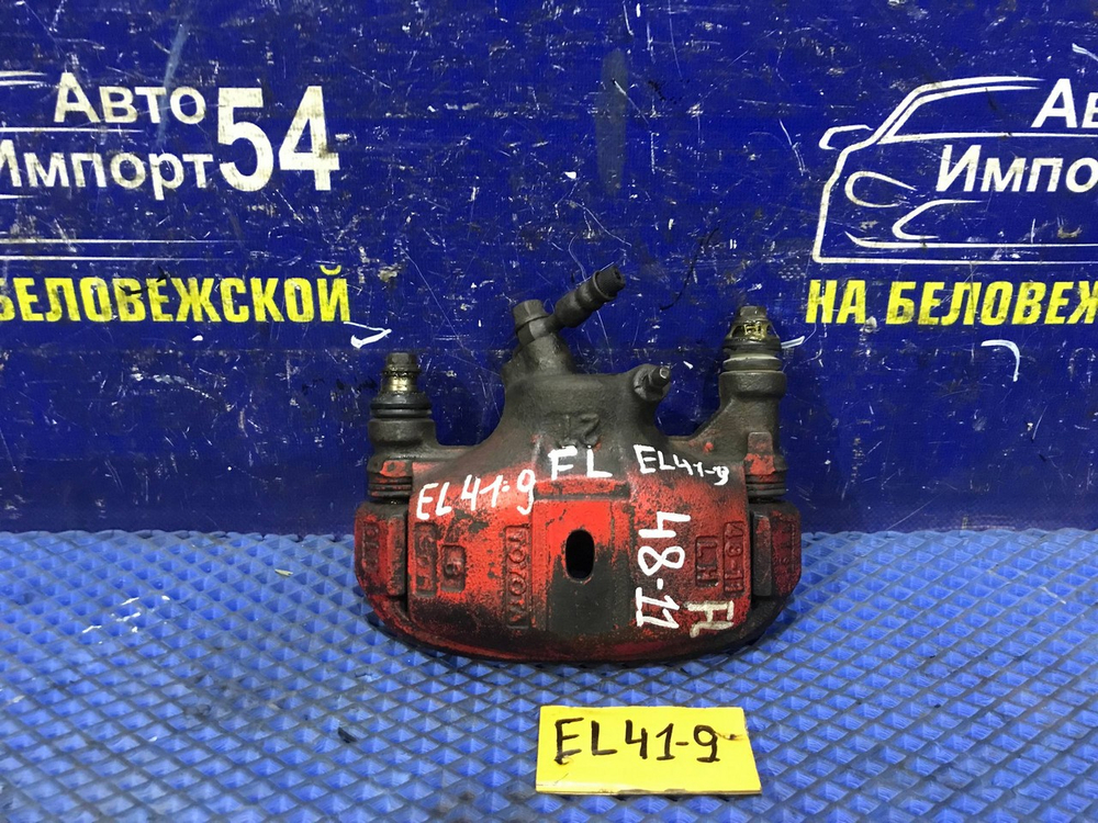 Суппорт тормозной передний левый TOYOTA CORSA 1991