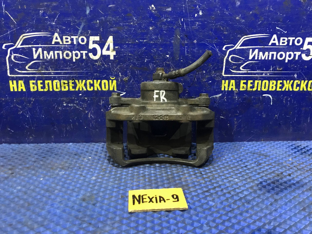 Суппорт тормозной передний правый DAEWOO NEXIA 2011