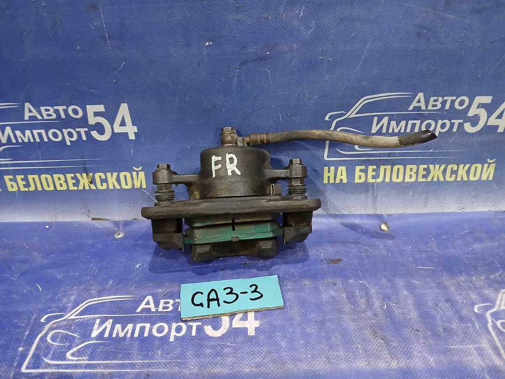 Суппорт тормозной передний правый Honda LOGO 1997