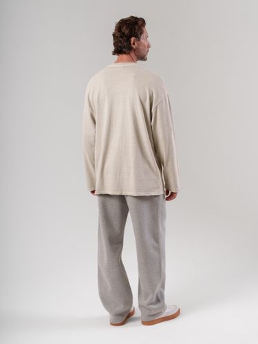 Бежевый лонгслив с необработанным краем