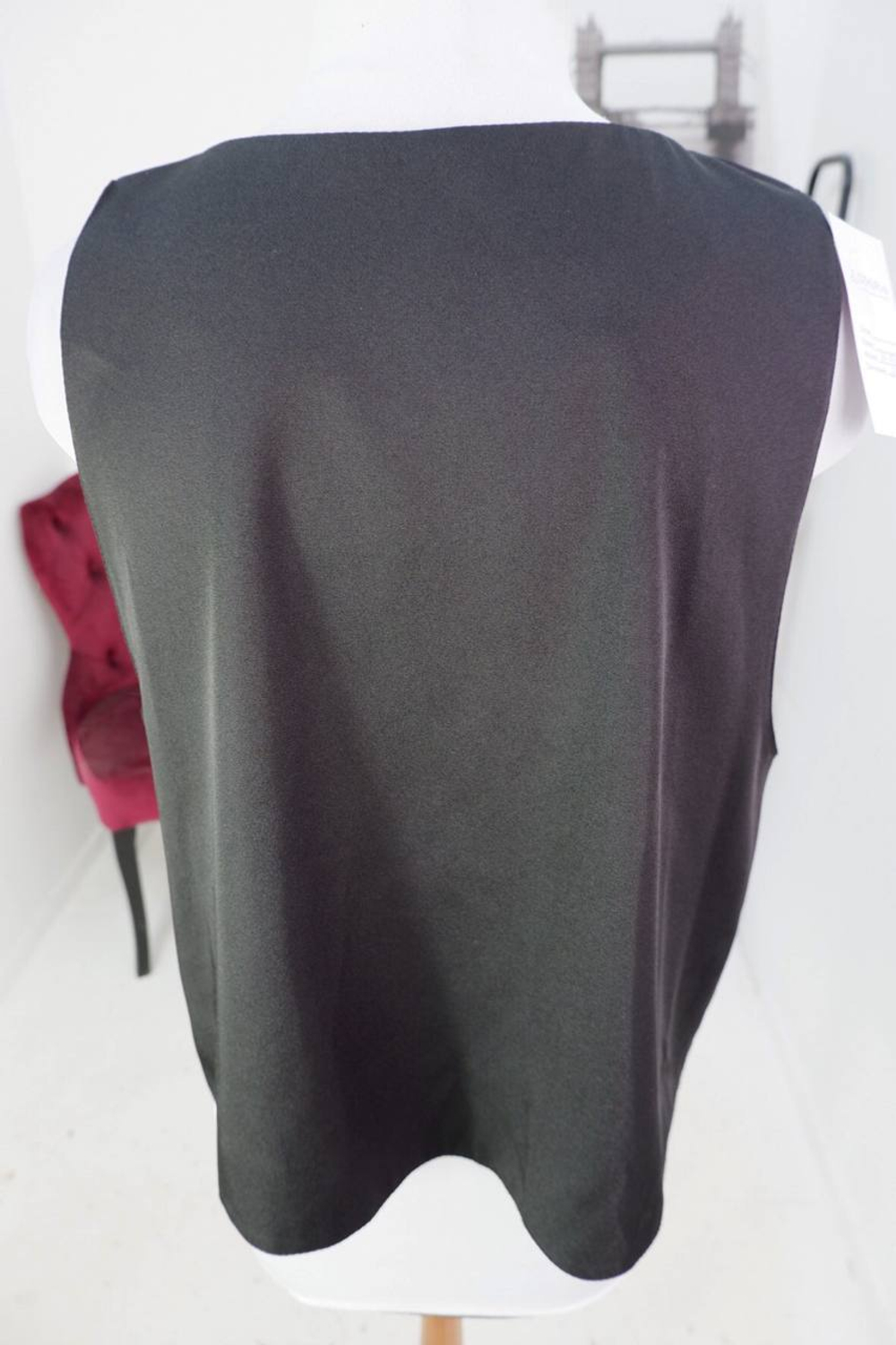 Топ свободный, визуально на 52 размер