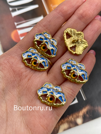 Пуговицы Скиапар. золотистые в форме глаза с белой и синей эмалью