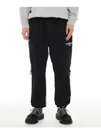 Брюки-джоггеры в стиле карго с молниями на карманах