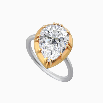 Кольцо из серебра с позолотой и цирконом в огранке «груша»