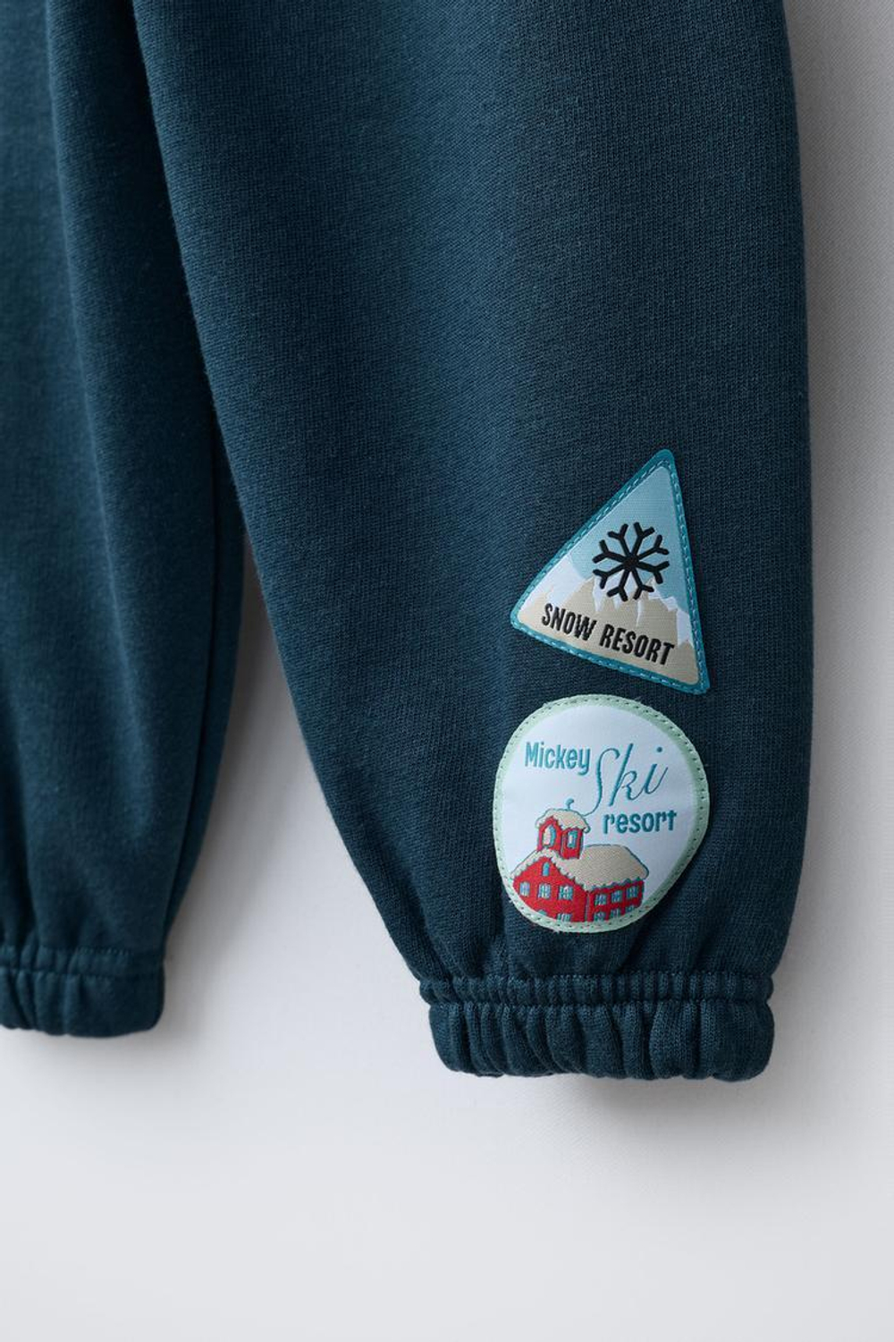 ZARA БРЮКИ-ДЖОГГЕРЫ FLOCK «МИККИ МАУС» © DISNEY, НЕФТЯНОЙ