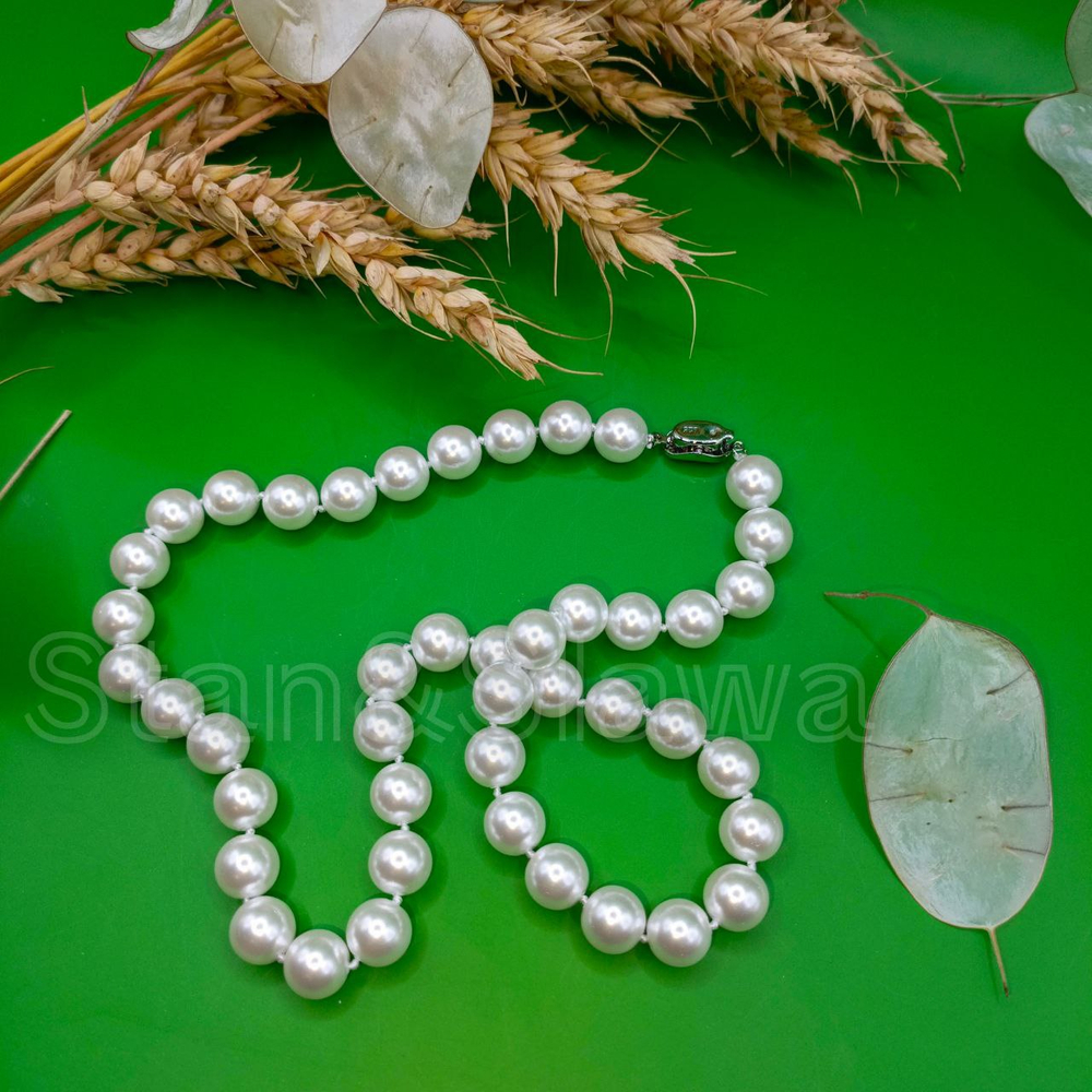 Ювелирное ожерелье из ракушек 10мм.