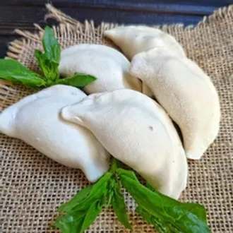 Пельмени из куриных грудок с грибам / 500 г