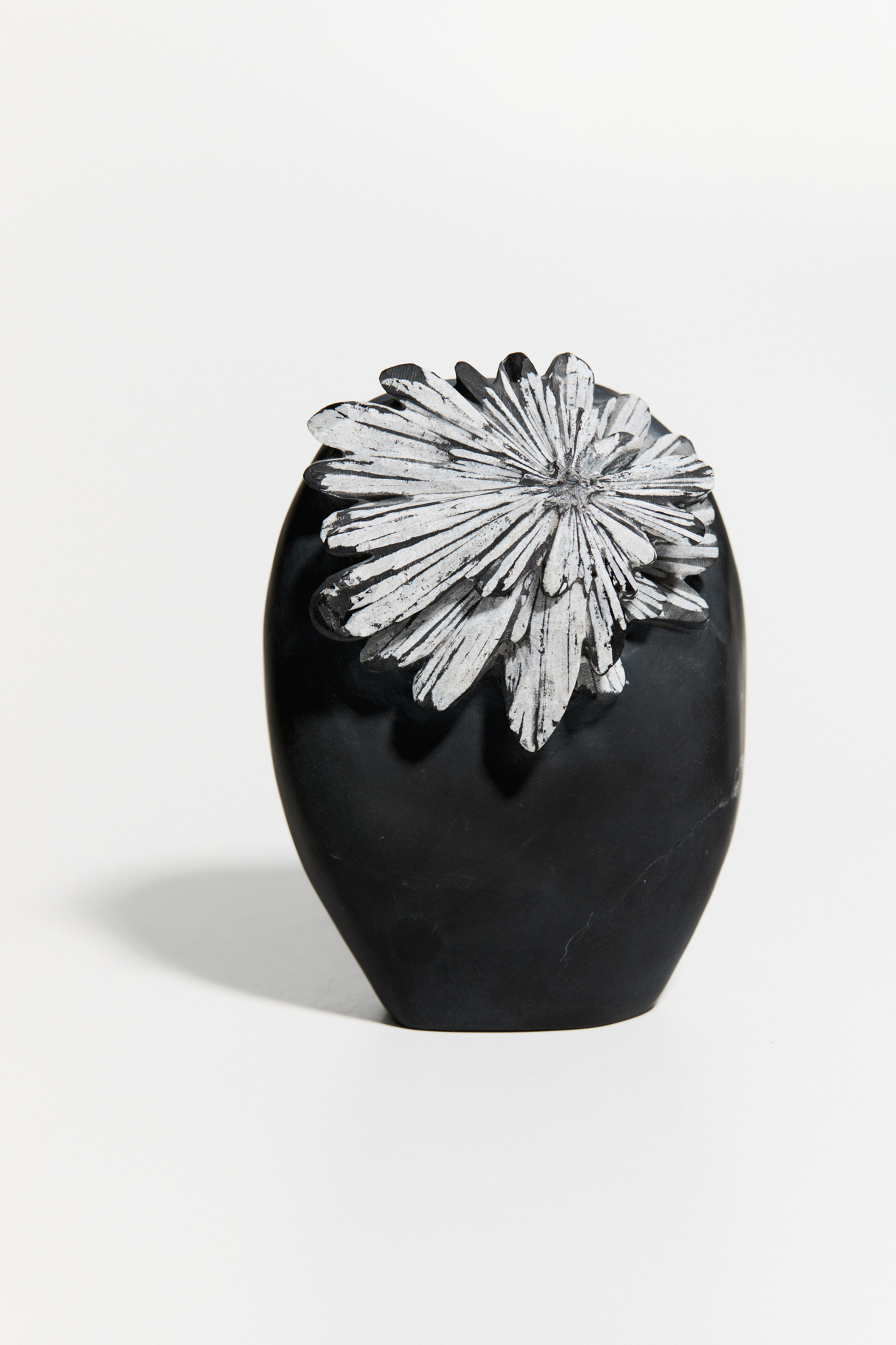 Хризантемный камень