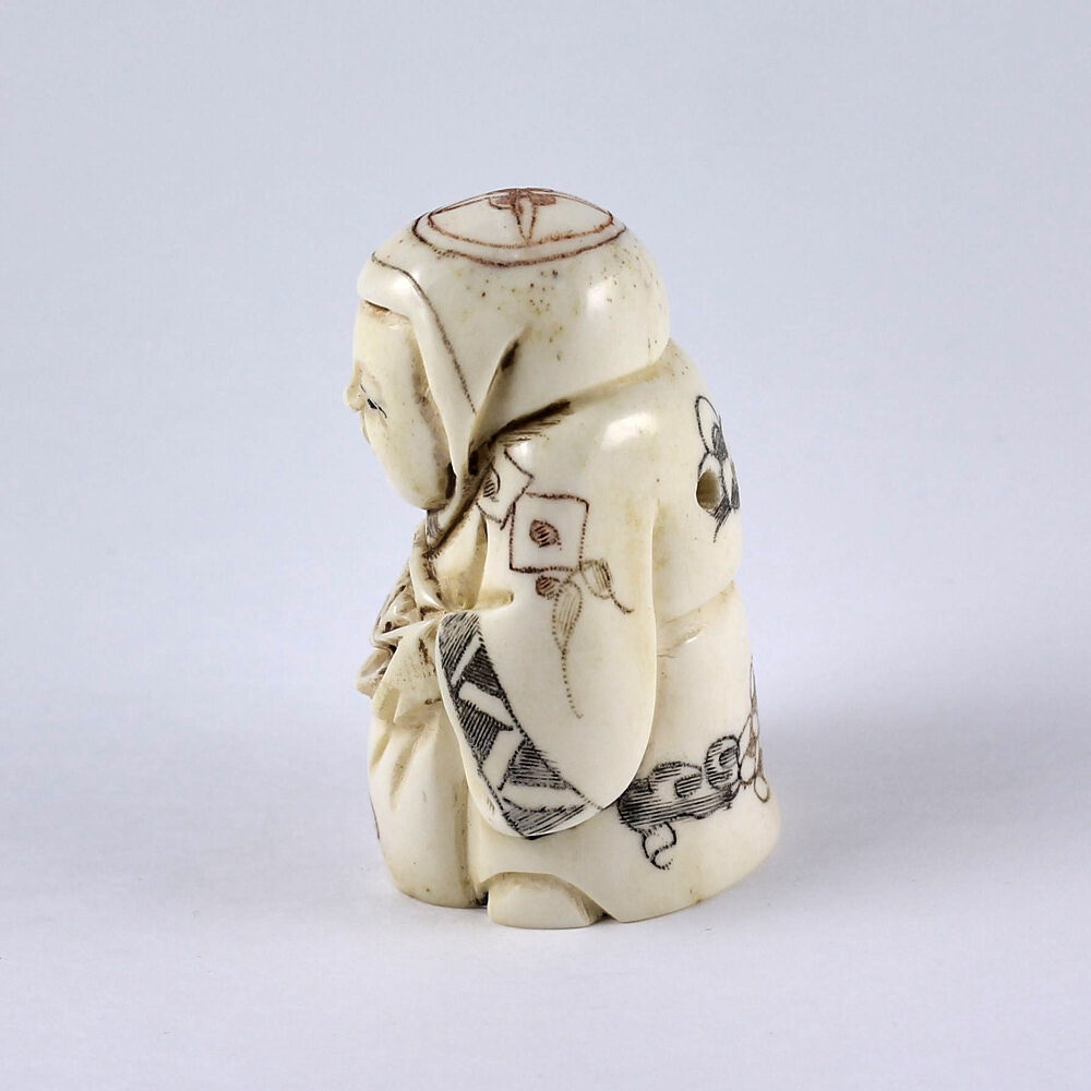 Нэцкэ Ребенок Карако с мешком риса