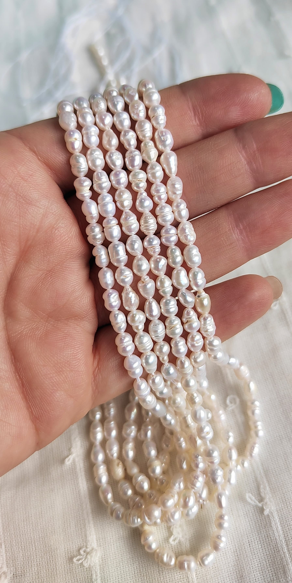 26534 Жемчуг "Рис" 4*5мм белый, 35см