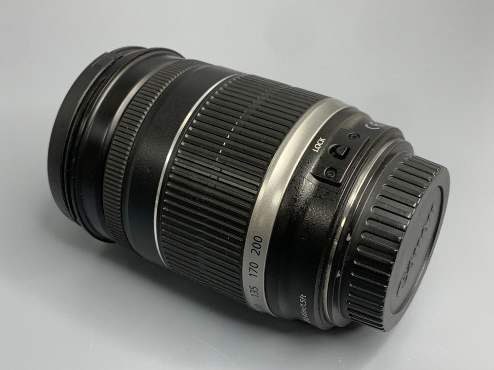 Canon EF-S 18-200mm IS Царапины на линзе
