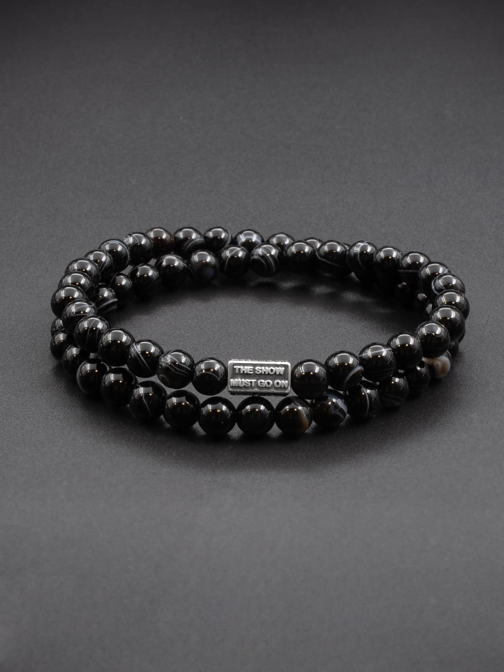 Двойной браслет Чёрный агат с полосками 6 мм + шарм THE SHOW MUST GO ON (серебро)